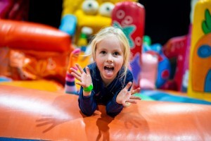 Girl on Inflatable Play