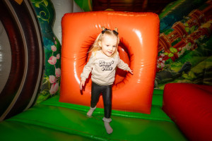 Little girl on Inflatable Play